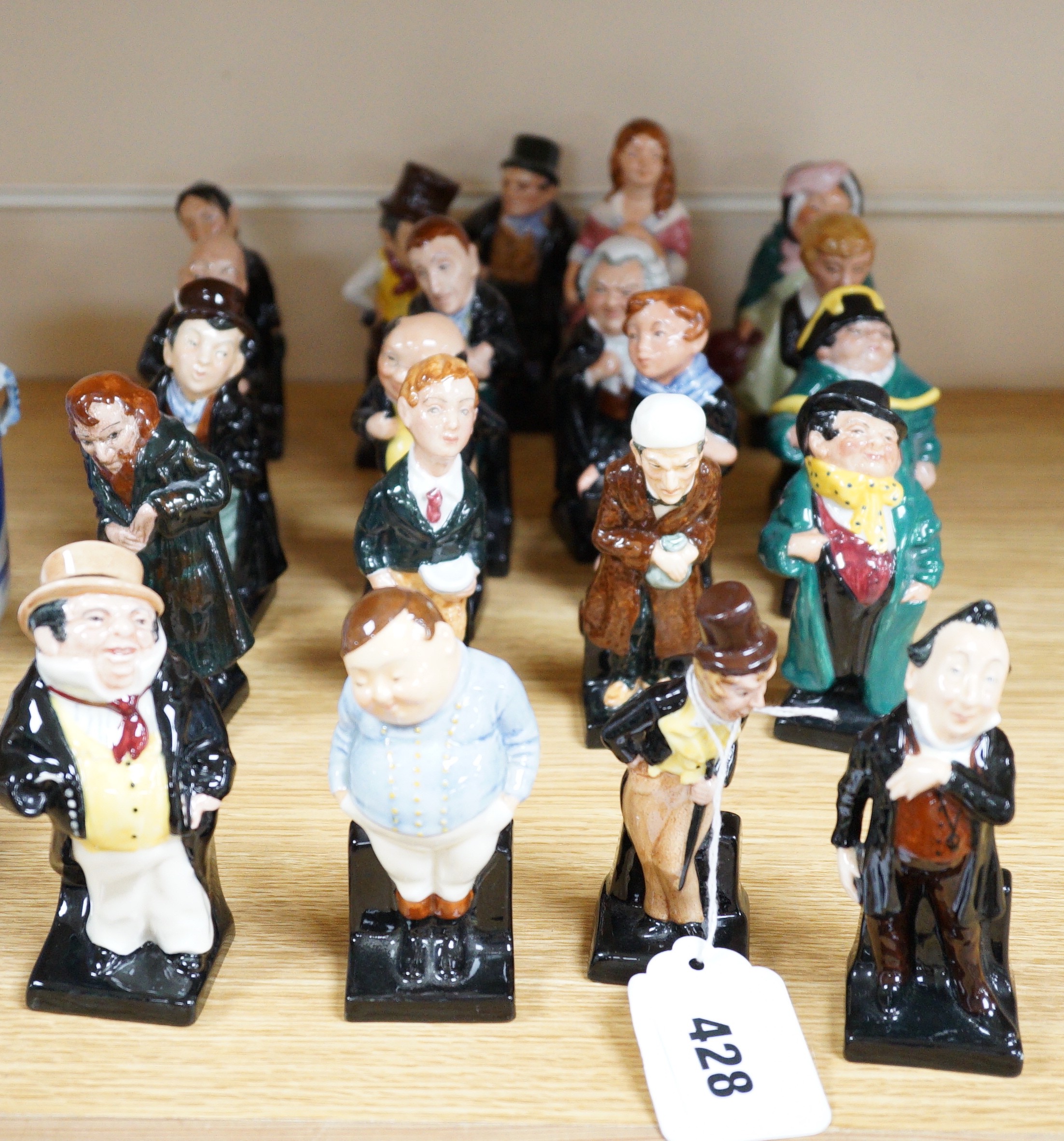 A group of twenty five Royal Doulton Dickens characters